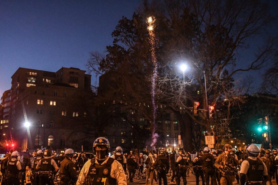 Police in helmets and riot gear downtown Washington, DC